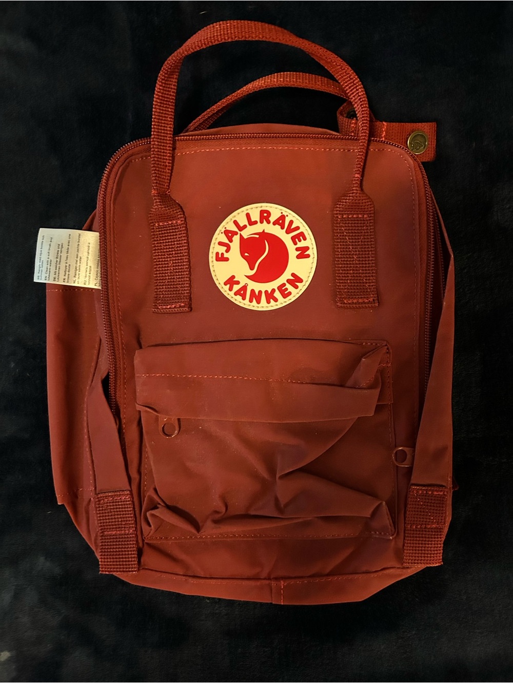 Fjallraven Kånken Mini Backpack in Rust Red